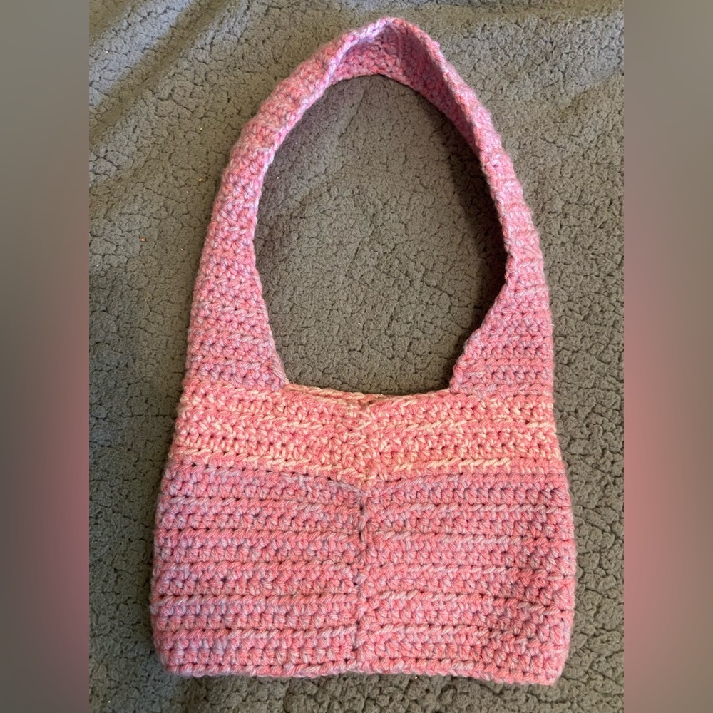 Personally made crocheted bag, 10”x7” with a 11.5” strap.
